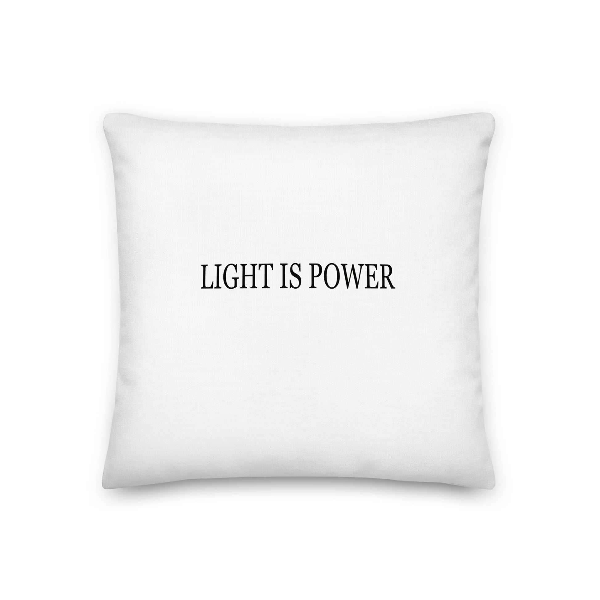 White pillow with 'LIGHT IS POWER' text on a white background
