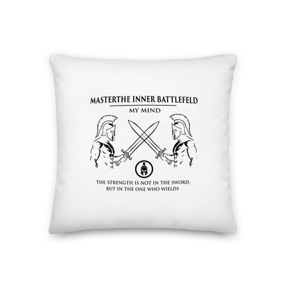 White pillow with black design and text on a white background