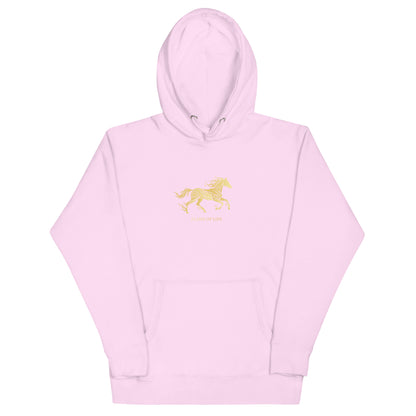 Pink hoodie with a a gold horse Flame of life design by the vision 2026.A symbol of inner fire, strength, and the spirit refuses to be tamed by the system.
