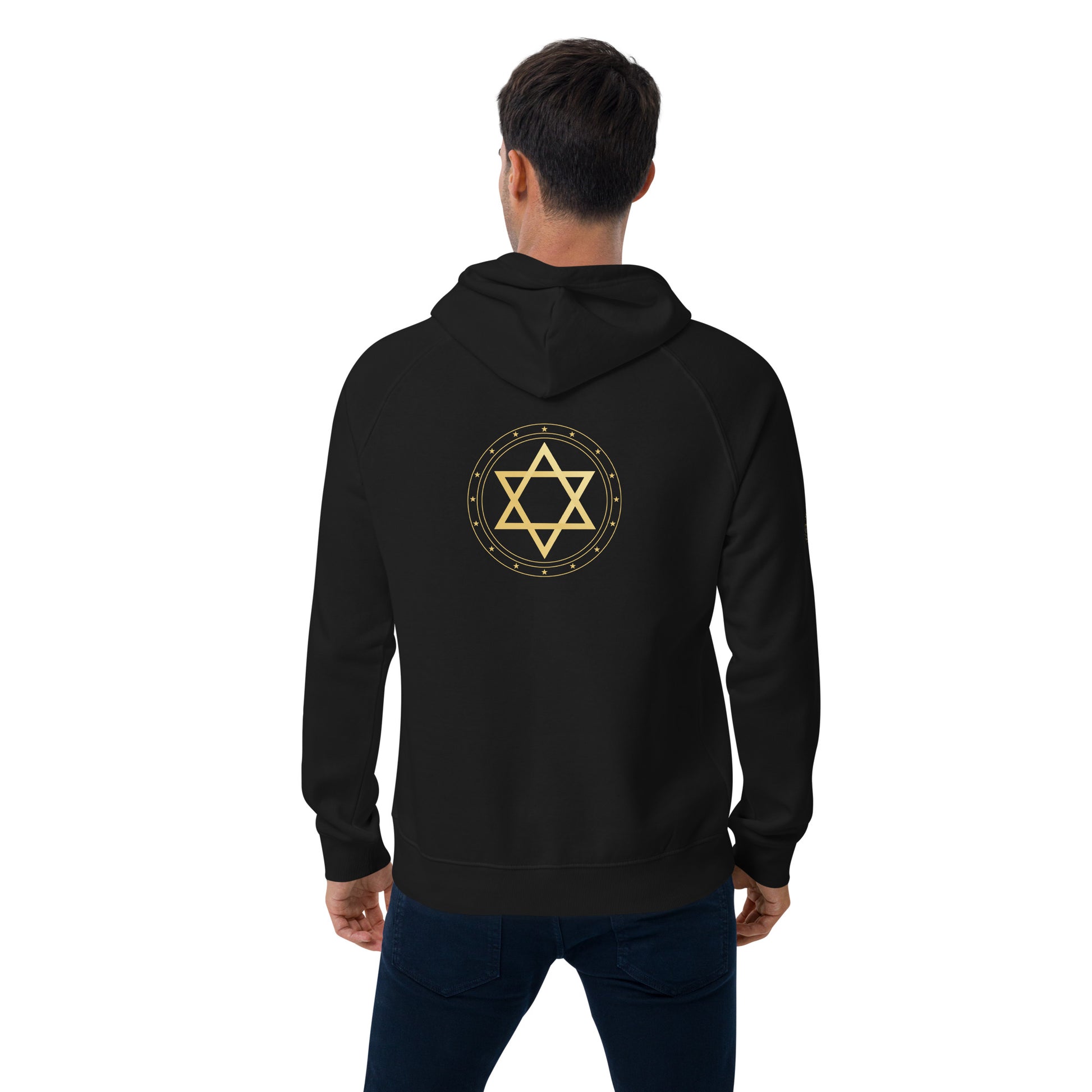 Person wearing a black hoodie with a Star gold protection of David symbol on the back against a white background